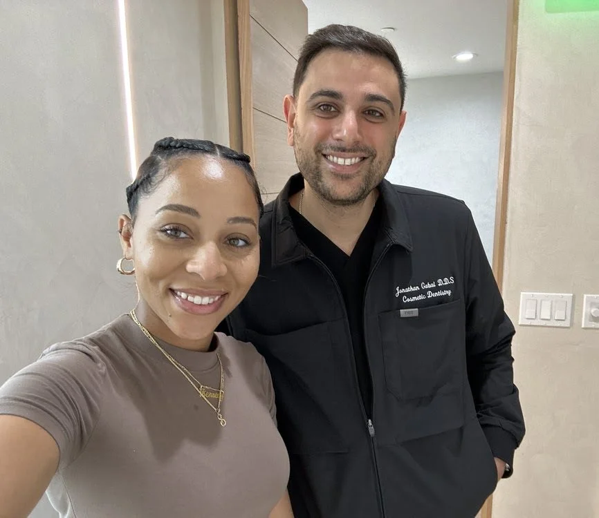 A joyful moment between Dr. Gabai and a satisfied patient. Exceptional care, personal connection, and beautiful results – Beverly Hills Dentistry.
