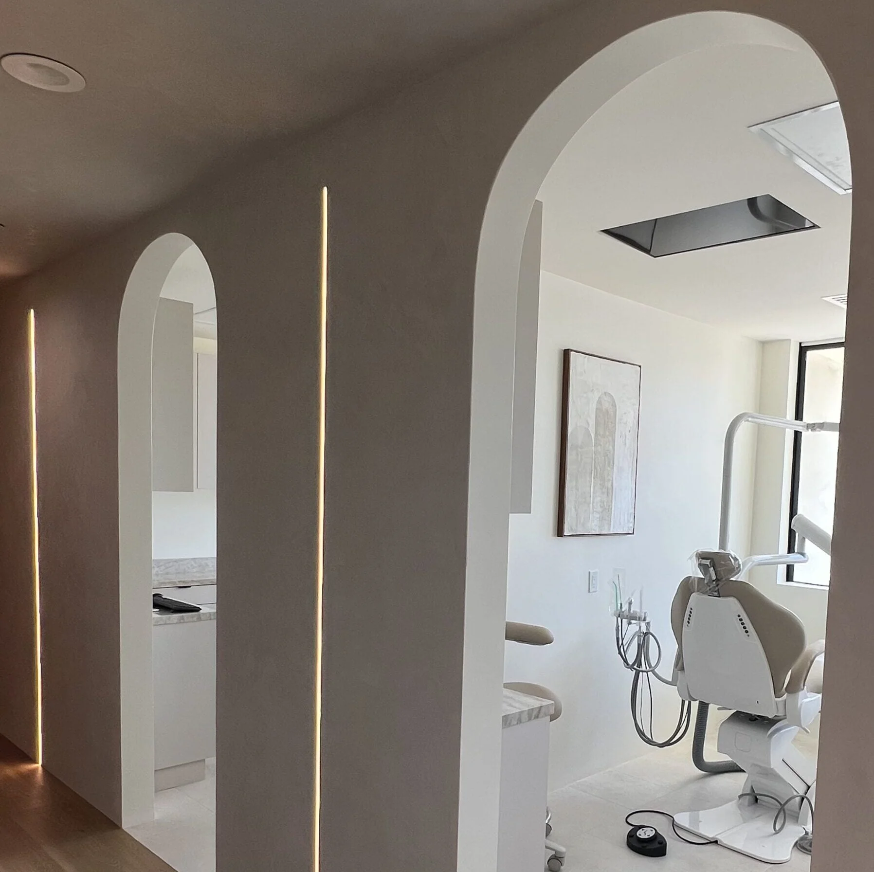 Explore the elegant, minimalistic design of the dental office. A calming, contemporary space that enhances every patient’s experience – Beverly Hills Dentistry.